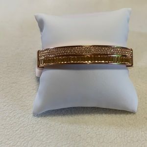 Michael Kors Rose Gold plated bangle, with baguettes and round crystals.